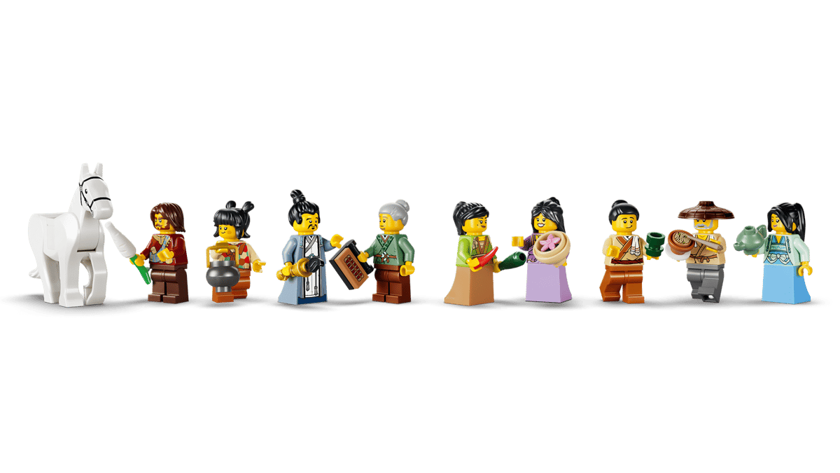 Row of LEGO figures with a white horse on a green background