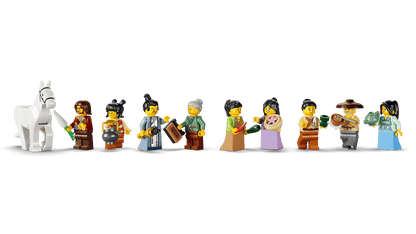 Row of LEGO figures with a white horse on a green background