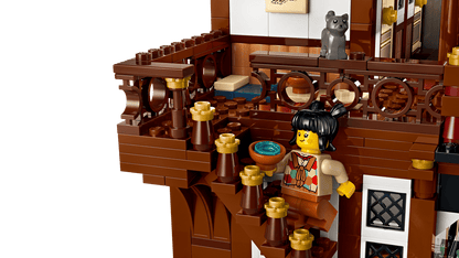 LEGO model of a traditional Chinese teahouse with a teapot and teacup.