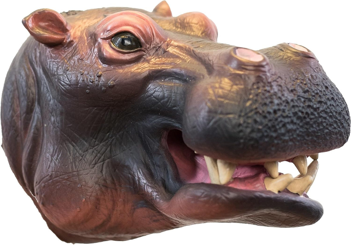 A realistic hippopotamus head hand puppet with textured skin, open mouth showing teeth, and pink inner details, isolated on a white background.